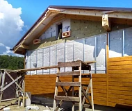 Завершённая облицовка фасада металлическим сайдингом