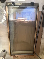 Демонтированный стеклопакет Velux с деревянной рамой