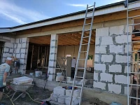 Завершенная работа по утеплению и отделке фасада