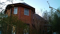 Деревянный дом с водосточной системой Металл Профиль, общий вид