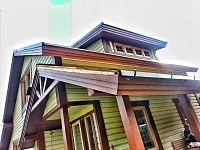 Дом с крышей из гибкой черепицы Shinglas, вид сбоку