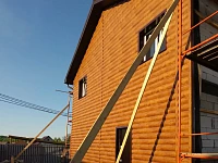 Готовый фасад с облицовкой металлическим сайдингом