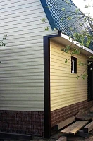 Фасадная обшивка здания профлистом Grand Line С8