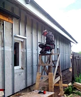 Облицовка фасада прочным металлическим сайдингом